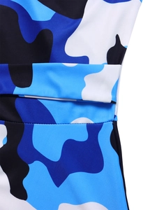 Close-up detail of blue and black floral print fabric with precise stitching and soft texture
