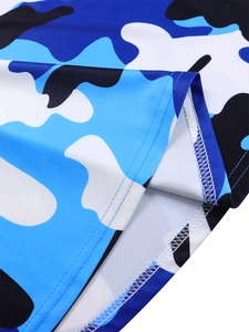 Detailed close-up of camouflage knit fabric hem with professional double stitching