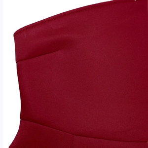 Close-up of wine red woven fabric texture and premium stitched edge for evening dress