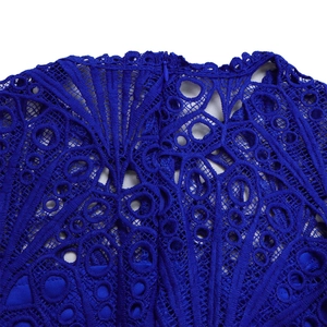 Detailed close-up of blue lace crochet patterns with high-quality invisible zipper back