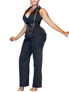 Chic black notched lapel sleeveless jumpsuit with gold chain waist and wide-leg trousers
