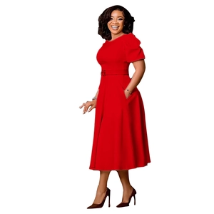 Detailed side view of a red crewneck dress with puff sleeves and waist tie belt