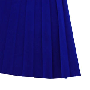Detailed view of royal blue pleated fabric with fine vertical lace crochet hollow texture