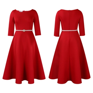 Detail showing the elegant pearl rhinestone belt on this red evening dress for girls