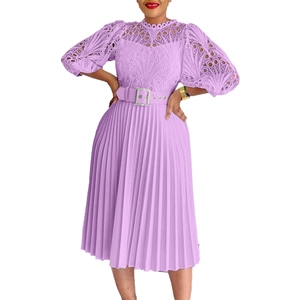Detail of lavender lace embroidery with hollow-out patterns and pleated skirt texture