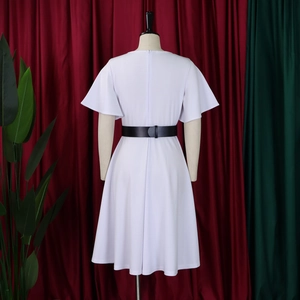 Detail of white V-neck dress back with elegant ruffle sleeves and black waist belt