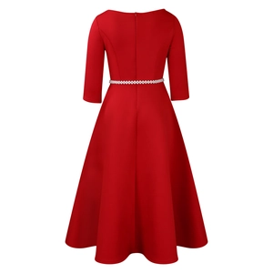Detail of the back of a dark red A-line evening dress with waist decor and invisible zipper
