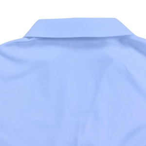 Close-up of the elegant V-neckline and collar detail on a light blue pleated dress