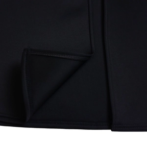 Macro detail of high-quality stitching and fabric texture on a black evening gown