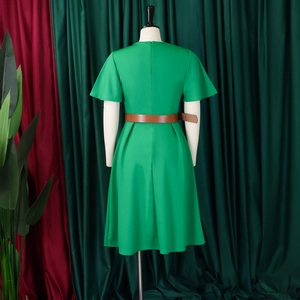 Detail of emerald V-neck A-line dress back view with invisible zipper and brown leather belt