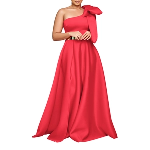 Detail of red one-shoulder evening gown with large bow and gold metallic belt