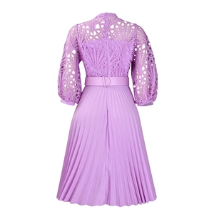 Detail of lavender lace embroidery with hollow out patterns and pleated skirt texture