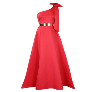 Detail of red one-shoulder evening gown with large bow decoration and gold mirror belt