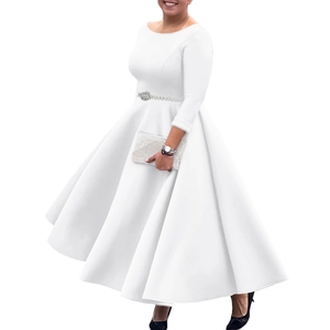 Detail of white long-sleeved A-line dress with elegant pearl belt and wide flare skirt