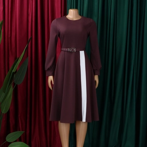 Detail of burgundy long sleeve dress with white contrast stripe and matching waist belt