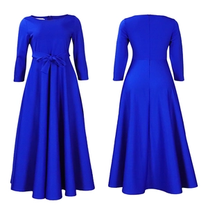 Detail of royal blue maxi dress featuring a high waist tie and elegant A-line silhouette