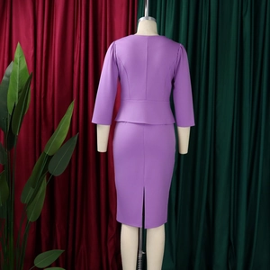 Rear view of purple elegant two-piece set with peplum waist and pencil skirt detail