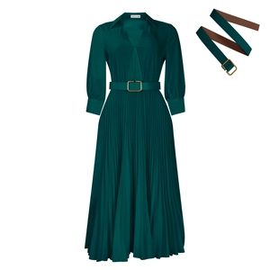 Detail of dark green pleated maxi dress with V-neck and matching gold buckle belt