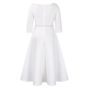 Detail view of the elegant white dress featuring a pearl belt and invisible back zipper