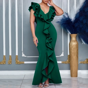 Detail of elegant V-neck ruffled dark green fishtail evening dress on a female model