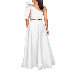 Back view of elegant white one-shoulder evening gown featuring a large bow and gold belt