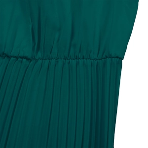 Detail of elegant dark green pleated dress fabric with micro pleats and fine texture