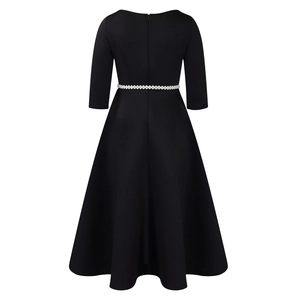 Back view of black A-line evening dress with elegant rhinestone belt and umbrella skirt