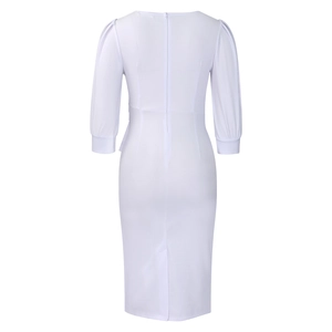 Rear view of a white bodycon dress with puff sleeves, back zipper, and hem slit detail
