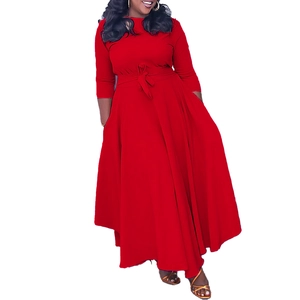 Detail of red maxi dress with waist drawstring tie and elegant A-line flowy skirt