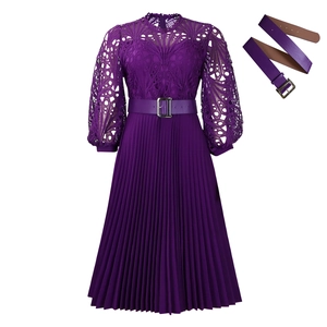 Detailed view of purple lace hollow out dress with pleated skirt and matching belt
