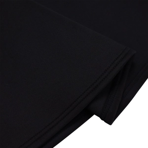 Detailed macro view of the neat double-needle stitching on high-quality black knit fabric