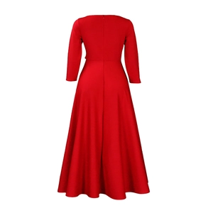 Detail of the back view of a red long-sleeve maxi dress showing the invisible zipper