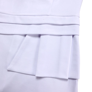 Macro shot of layered pleats and textured fabric on a lavender bodycon dress