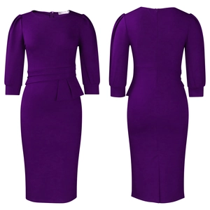 Detail of purple bodycon dress with puff sleeves, waist pleats and back slit