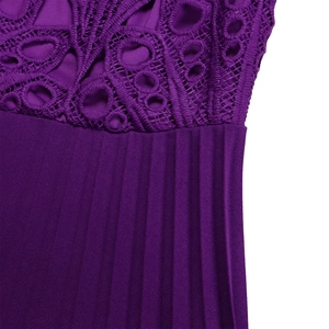 Close-up of dark purple dress featuring floral lace hollow out and pleated fabric texture