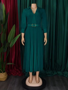 Elegant deep green V-neck pleated maxi dress with long sleeves and a matching gold belt