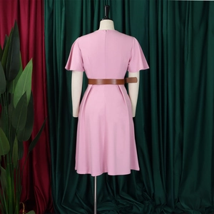 Detail of pink A-line dress with V-neck, short sleeves and brown faux leather belt waist