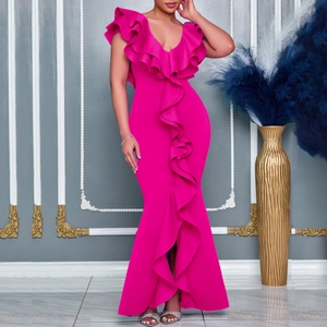 Detail of hot pink V-neck mermaid dress featuring elegant ruffle layers and side slit design