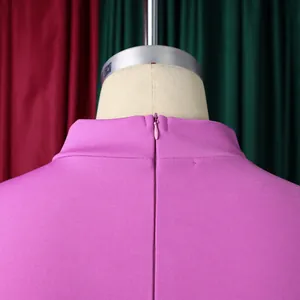 Detail of the high collar back with a hidden zipper on this elegant purple dress