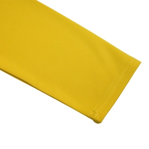 Detail of yellow long sleeve cuff featuring high-quality double-needle stitching and fabric