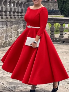 Elegant red boat neck long sleeve evening gown with sparkling rhinestone waist belt detail