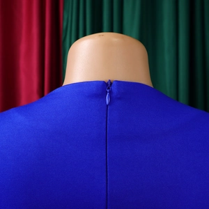 Detail of royal blue dress featuring high-density fabric and a hidden back zipper