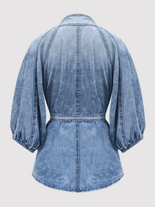 Retro light blue denim shirt with lantern sleeves and belted waist, back view