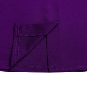 Detail of double-needle stitching and slit on a deep purple plus size dress hem