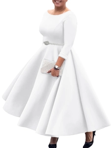 Elegant white long sleeve evening dress with round neck and pearl belt detail