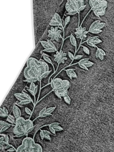 Women's dark grey slim denim pants with mint green floral embroidery details
