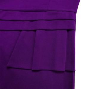 Detailed macro view of purple pleated knit fabric with elegant overlapping texture