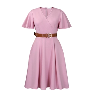 Detail view of the V-neckline and ruffled bell sleeves on this pink African style dress