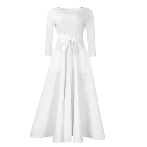 Detail view of white long-sleeved dress with elegant waist tie and round neckline