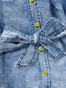 Retro denim shirt with lantern sleeves, contrast yellow buttons and waist tie belt